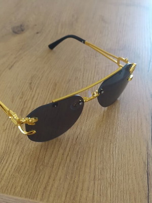 Women's sunglasses, black and gold, new with case