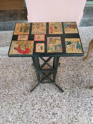 Table used iron with comic designs