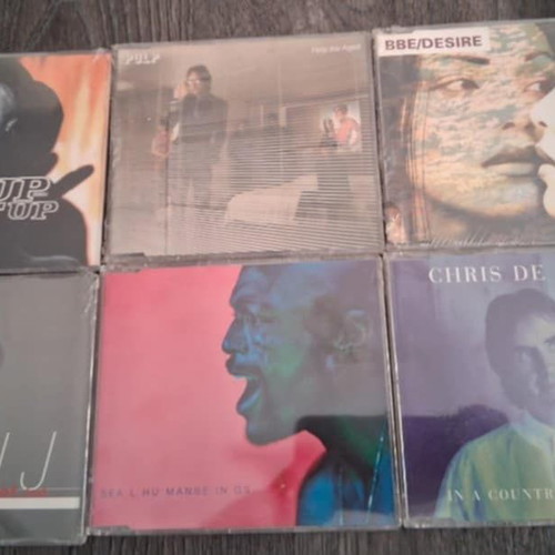 CD singles 90s new, pack of 18 sealed