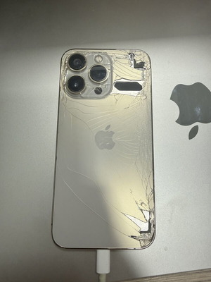 Apple iPhone 13 Pro 256GB gold with cracked back and case