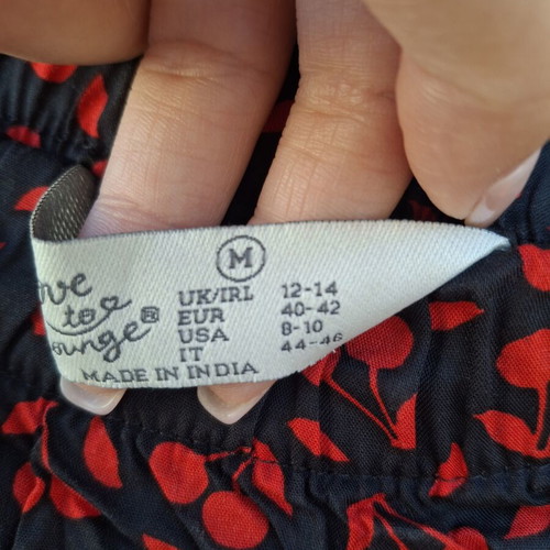 Women's Short Shorts like new, size medium, black and red