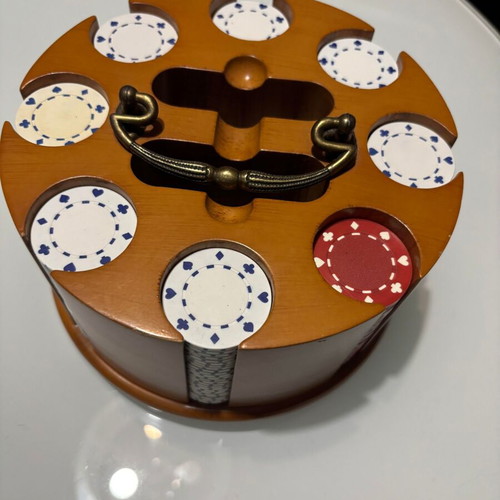 Wooden rotating case with chips like new