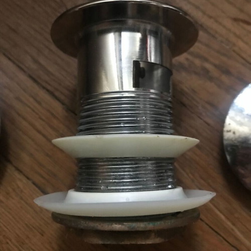 Brass mushroom sink valve used with two caps
