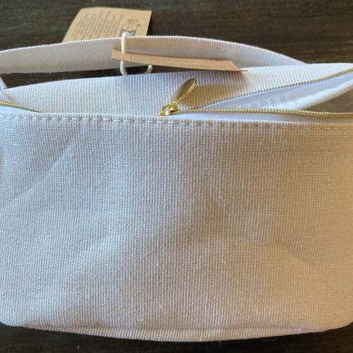 White toiletry bag new with iridescent golden threads