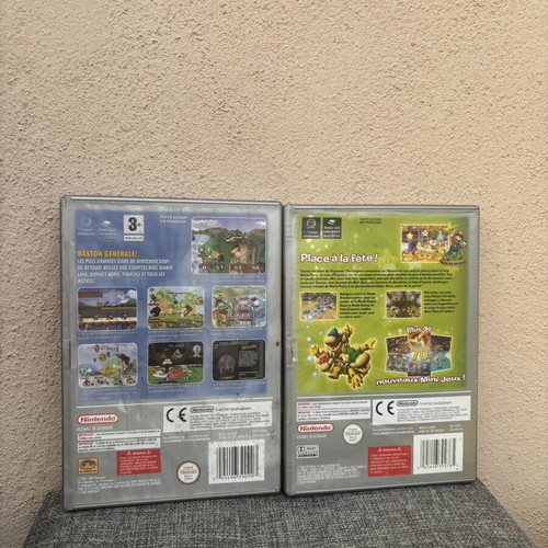 GameCube empty cases with Mario manual