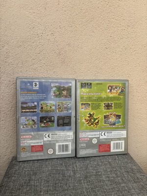 GameCube empty cases with Mario manual
