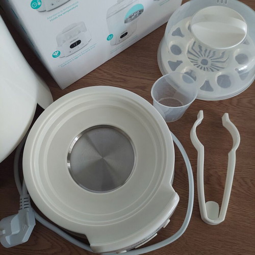 Miniland sterilizer like new, multifunctional