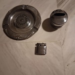Plastic ashtray with lighter base