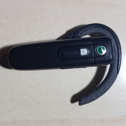 Sony Ericsson HBH-PV703 Bluetooth headset used with charger