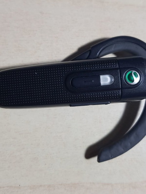 Sony Ericsson HBH-PV703 Bluetooth headset used with charger