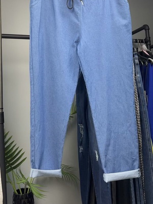 Light blue plus size jogger jeans with elastic waist and drawstring