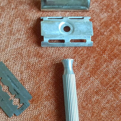 Vintage twist-to-open safety razor used