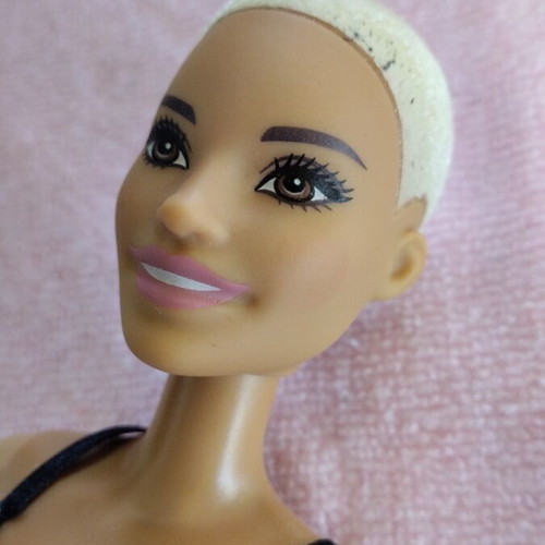 Barbie doll 2015 used with small mark on head