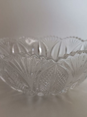Glass tall bowl with embossed designs like new
