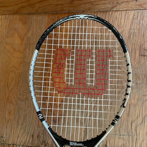 Wilson tennis racket used with minor wear