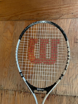 Wilson tennis racket used with minor wear