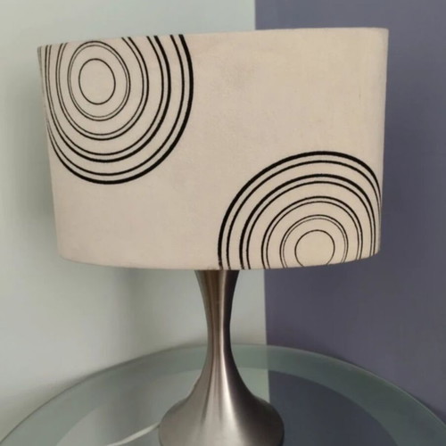 Table lamp with oval beige shade and black details like new