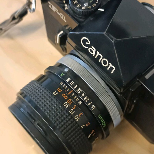 Canon F-1 with 50mm f/1.4 lens used with original leather case
