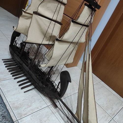 Handmade wooden sailboat used