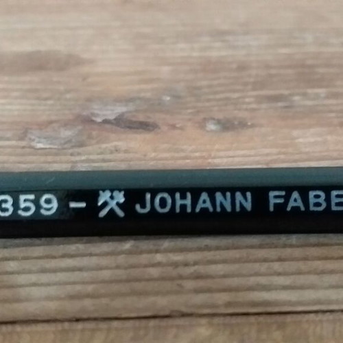 Faber collectible pencils and tin box like new