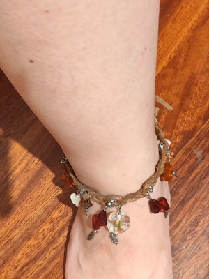 Anklet leather with various earth-tone charms, 27 cm, like new