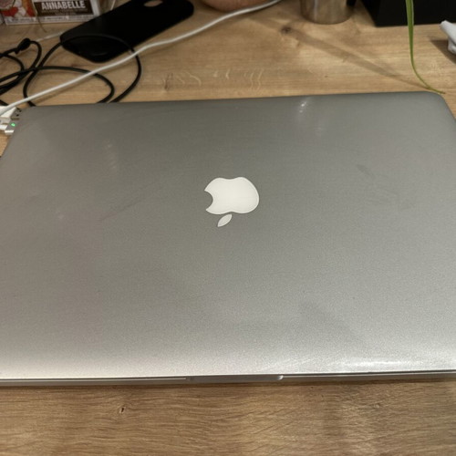 MacBook Pro 2013 15-inch laptop with charger