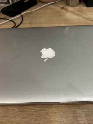 MacBook Pro 2013 15-inch laptop with charger