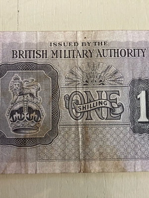 One shilling banknote of British Military Authorities like new, framed