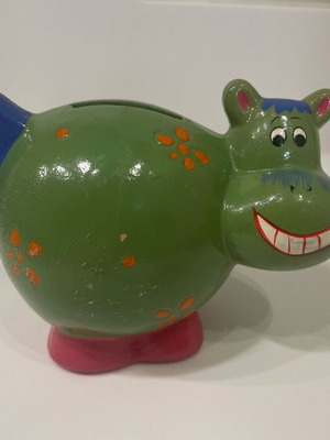 Hippo piggy bank used, clay with plastic stopper