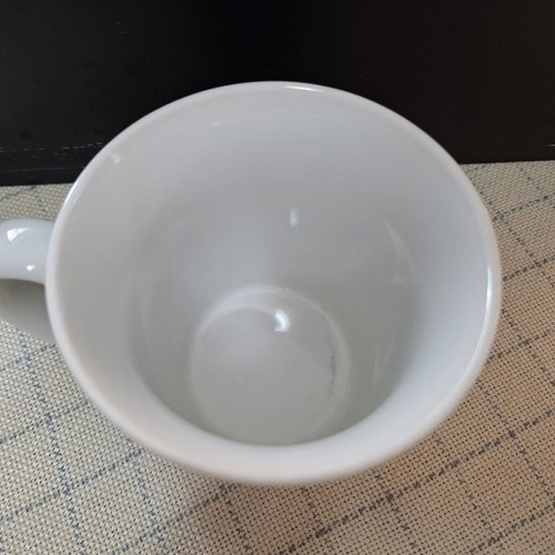 Illusion porcelain mug used