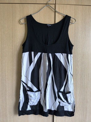 Blouzoforema black and white size L like new