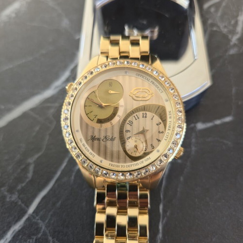 Marc Ecko gold-tone wristwatch with crystal bezel