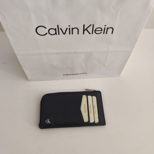 Calvin Klein leather card holder like new, black, 4 card slots