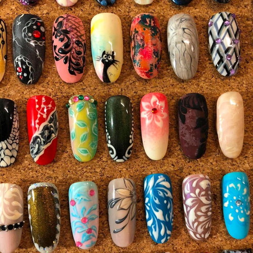 Board with 187 professional nail design tips, vintage collectible
