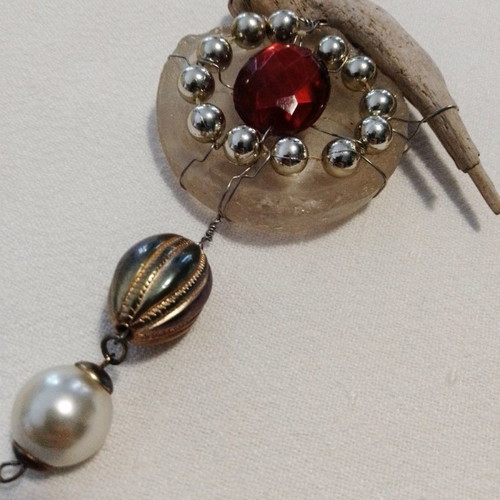 Signed micro-sculpture used, with glass, wood, beads