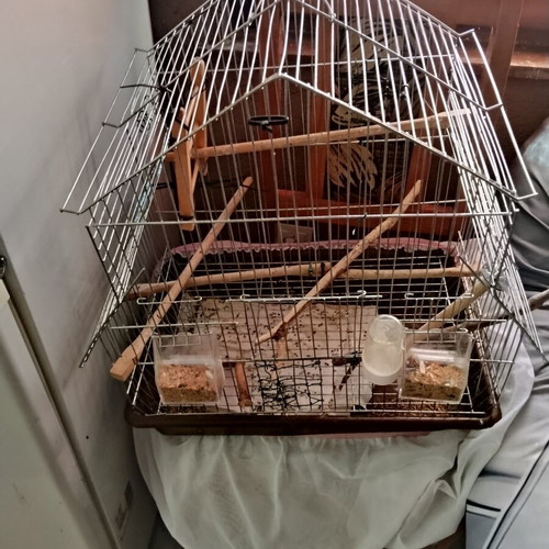 Birdcage for small and medium birds with house-shaped roof and accessories