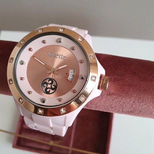 Oxette pink women's watch with rubber strap and pink gold dial like new