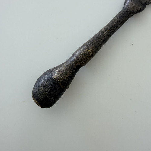 Brass beer opener with horse leg and horseshoe end used