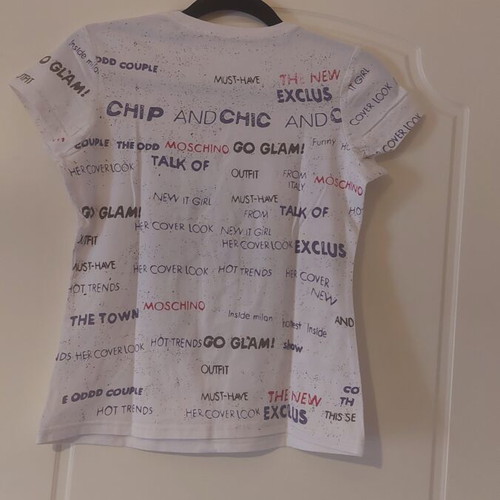 Short-sleeve t-shirt with designs size M like new, white and purple