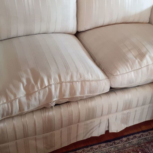 Two-seater sofa used 1.40x0.85 m with silk-cotton filling