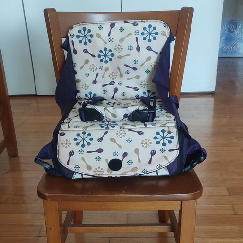 Munchkin portable feeding seat used