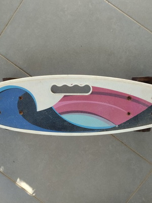 Skateboard used with light-up wheels and protective gear