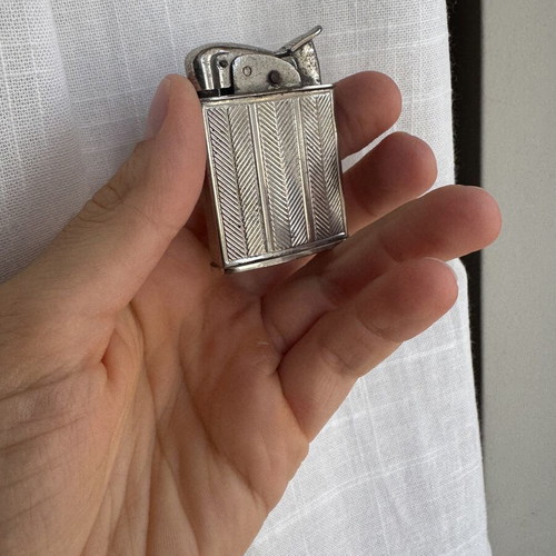 Evans Vintage lighter used with wear