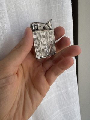 Evans Vintage lighter used with wear