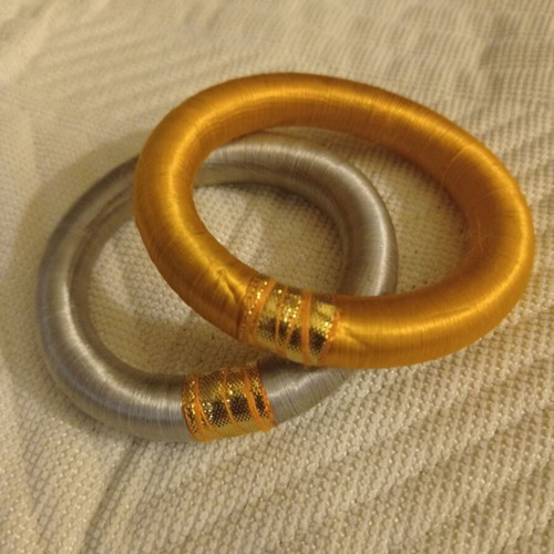 Set of 2 bracelets used, 6.5cm inner width