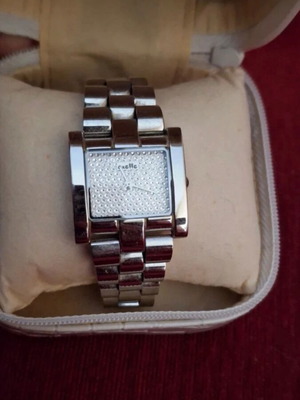 Oxette women's wristwatch like new, silver color