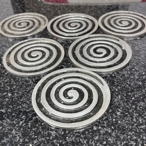 Metal Spiral Coasters like new