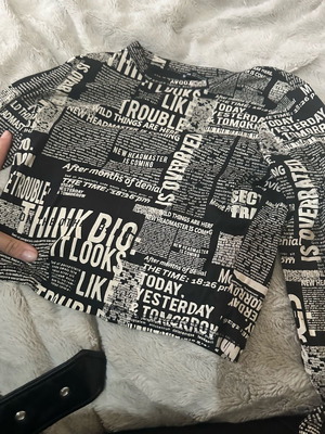Top black and white newspaper print cropped new