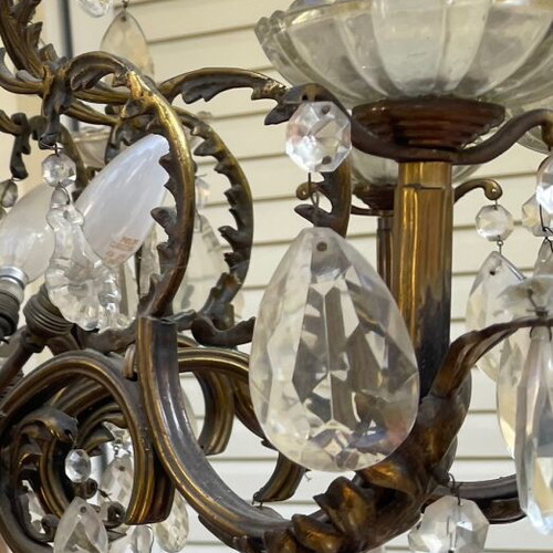 Antique chandelier used with bronze and crystal