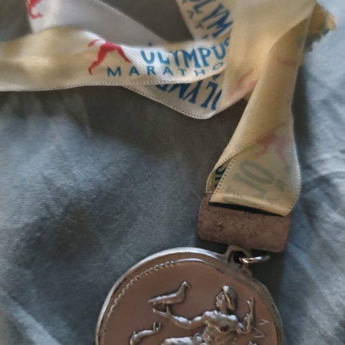 2012 Olympus Marathon finishing medal used